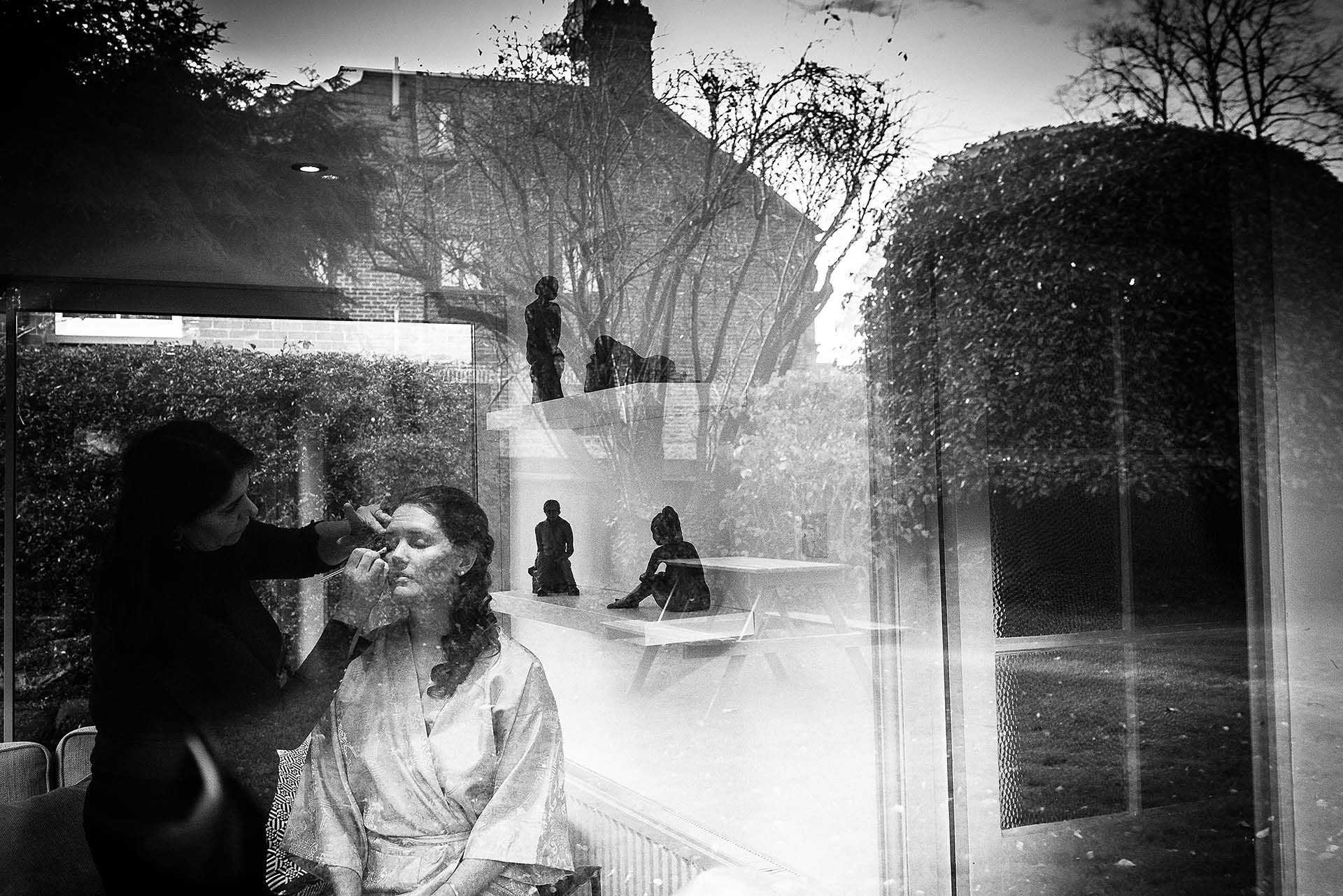 bridal_preps_through_window-2x-53da53f4