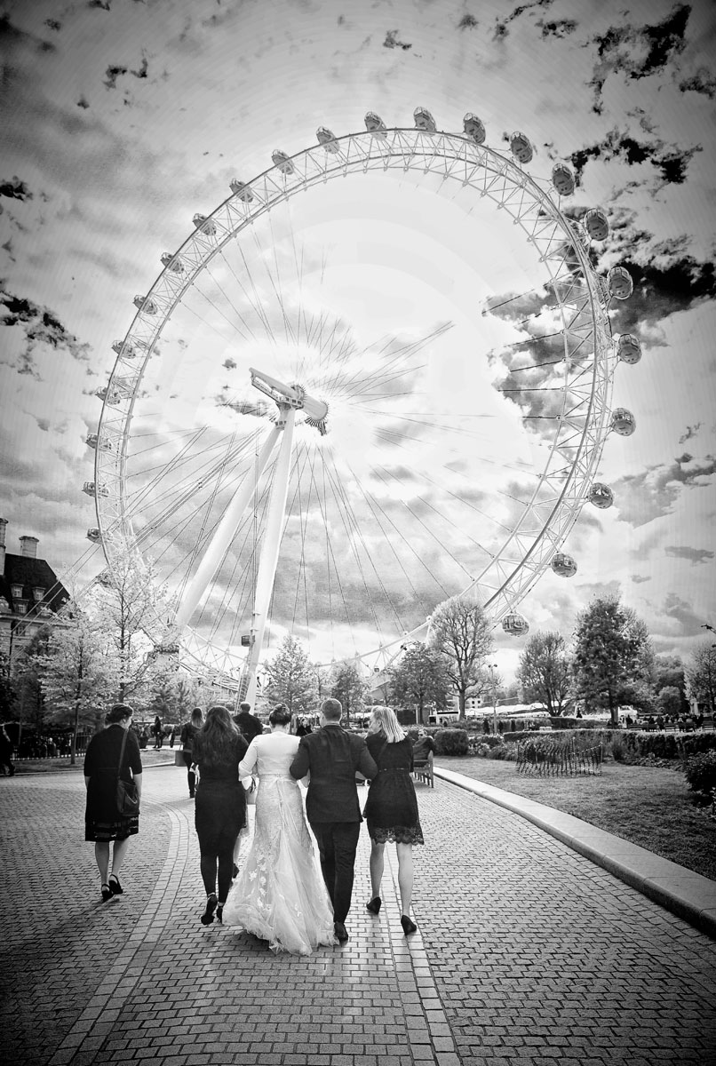 Bride-and-groom-walking-to-their-London-Eye-Wedding-ceremony
