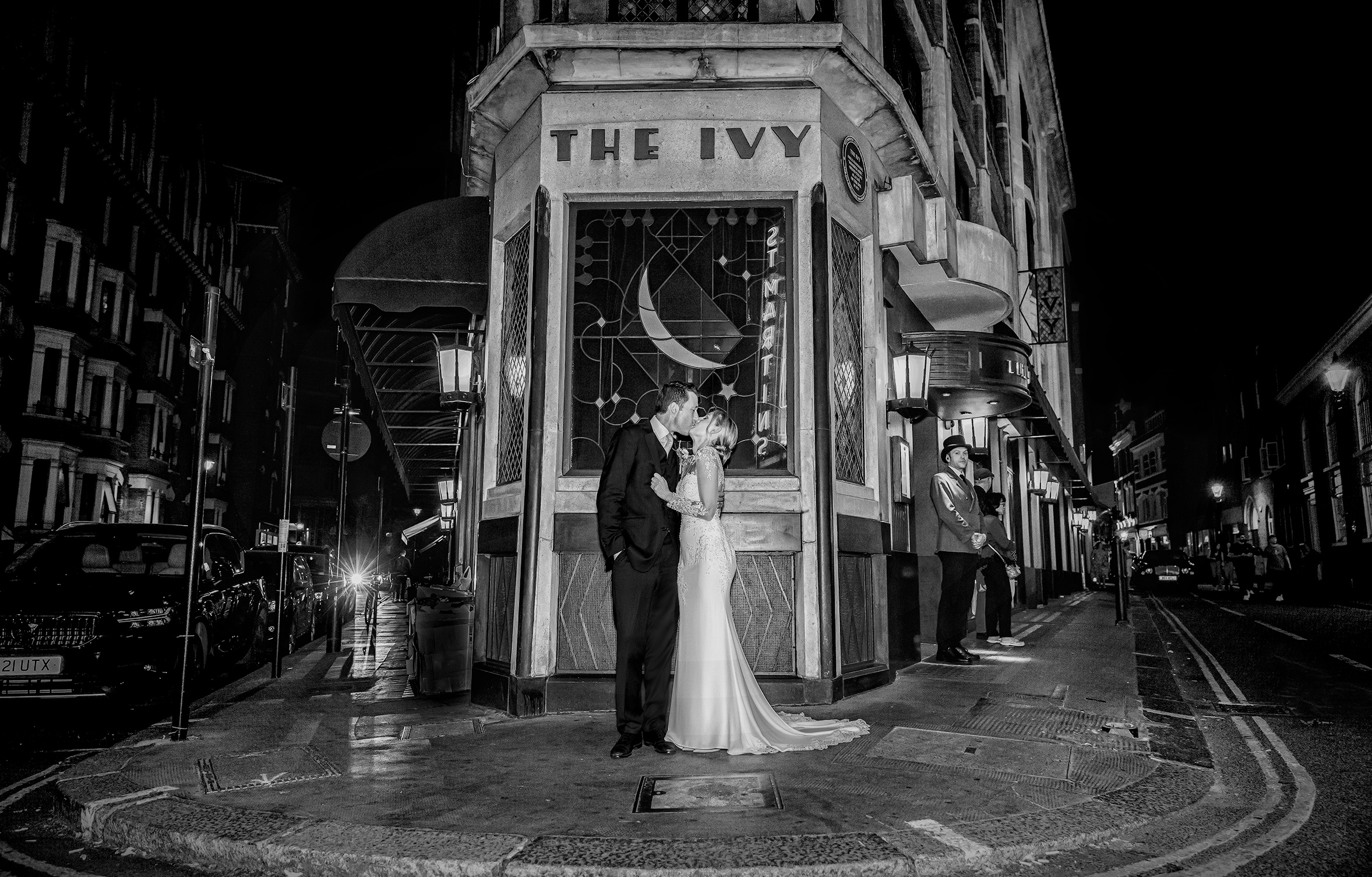 Wedding-couple-kiss-outside-The-Ivy-central-London-image (listing)