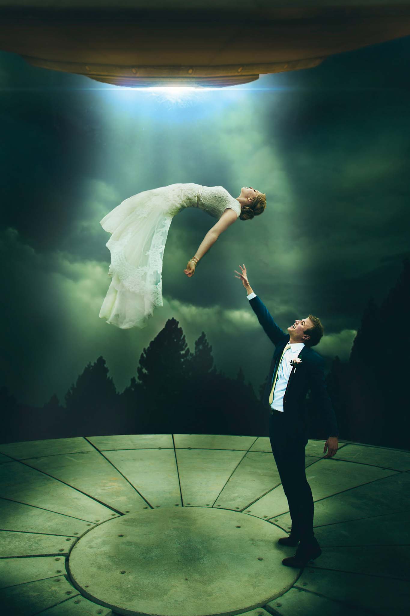 Fairytale wedding photography of a man and woman flying in wedding attire. (listing)