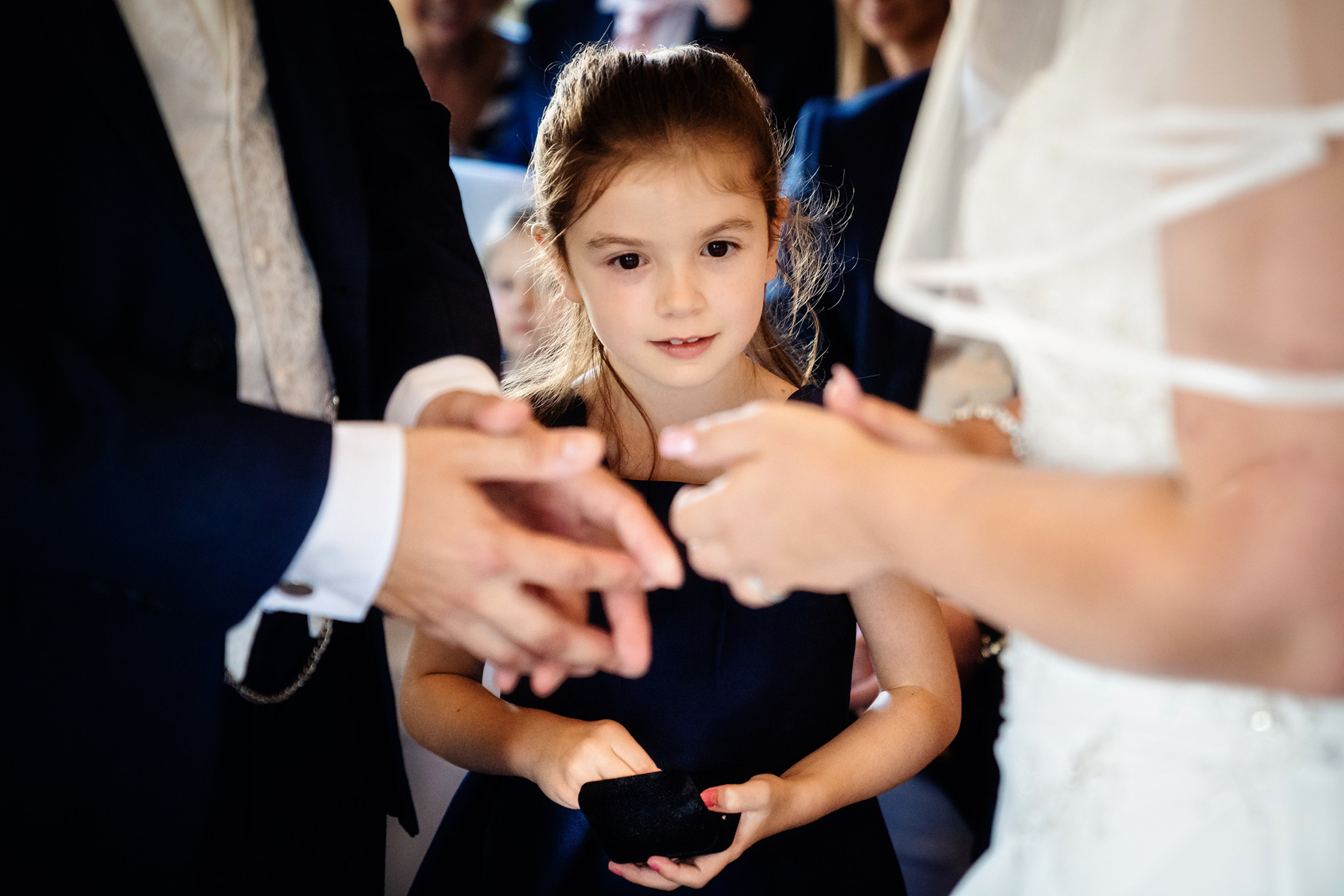 flowergirl-stares-at-rings-wedissimo-wedding (listing)