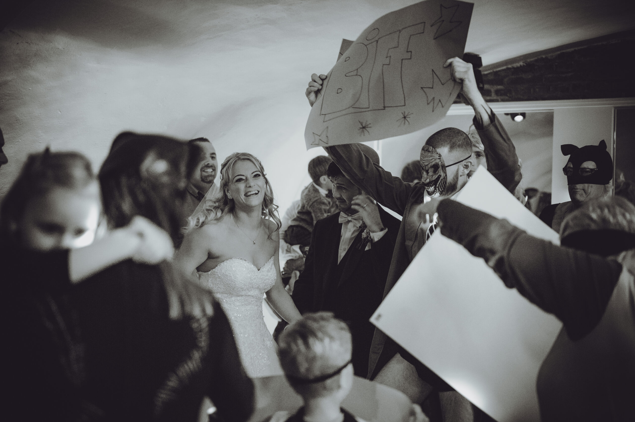A black and white photo of a group of people holding signs. (listing)