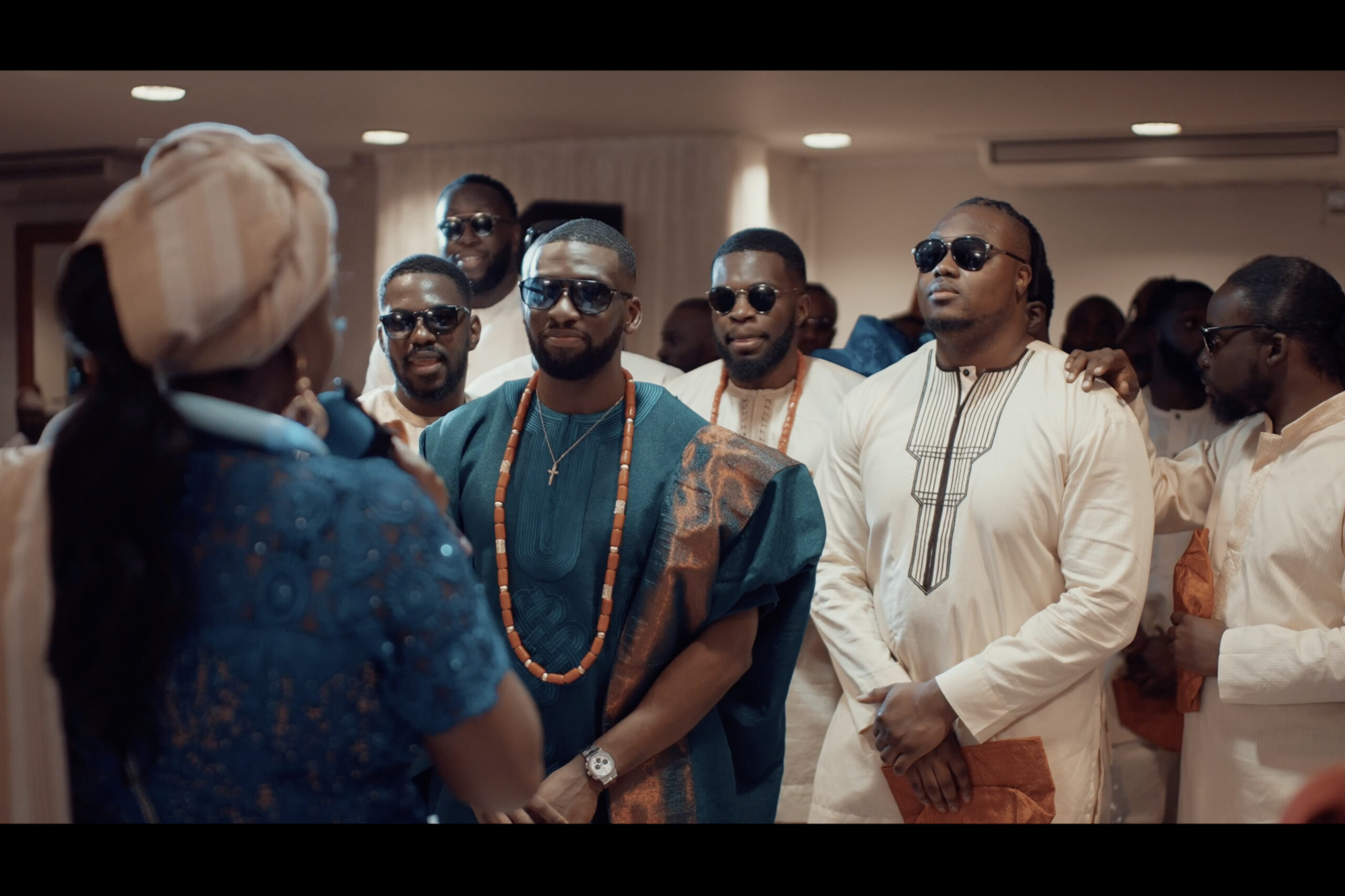 A group of men dressed in traditional african attire. (listing)